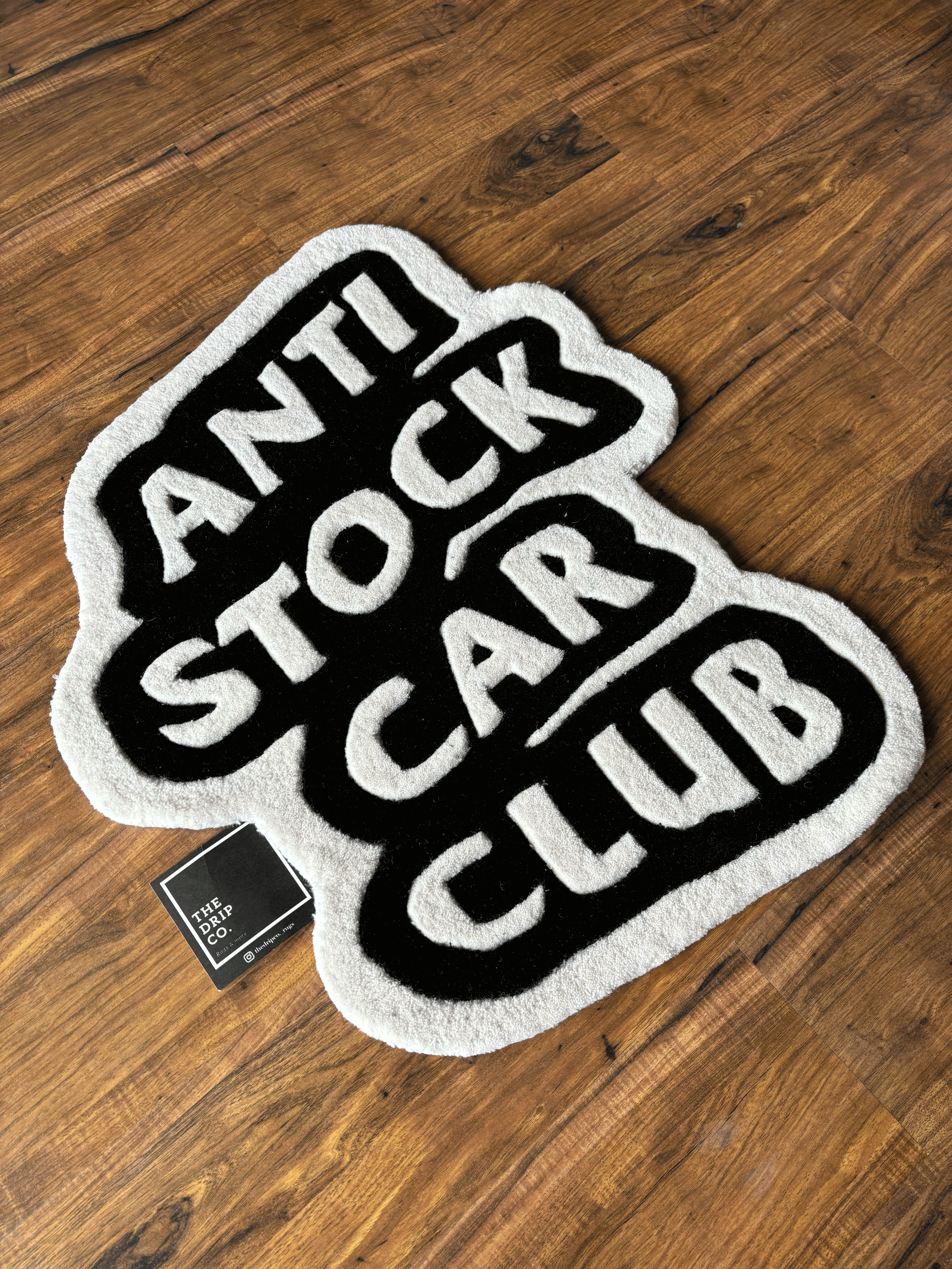 Anti Stock Car Club Hand Tufted Rug by The Drip Co.