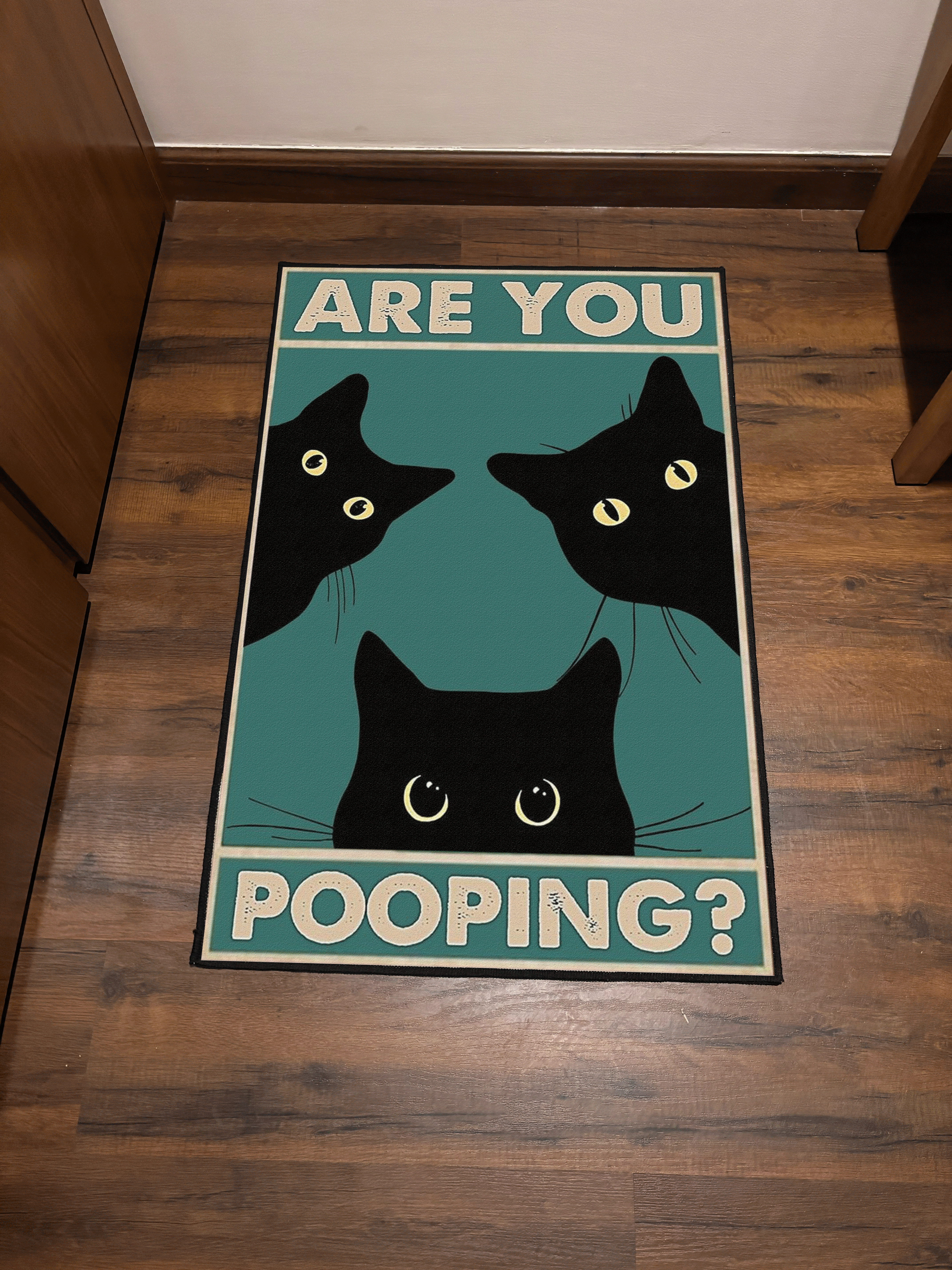 Cat Pooping Door Washable Rug by the Drip Co.