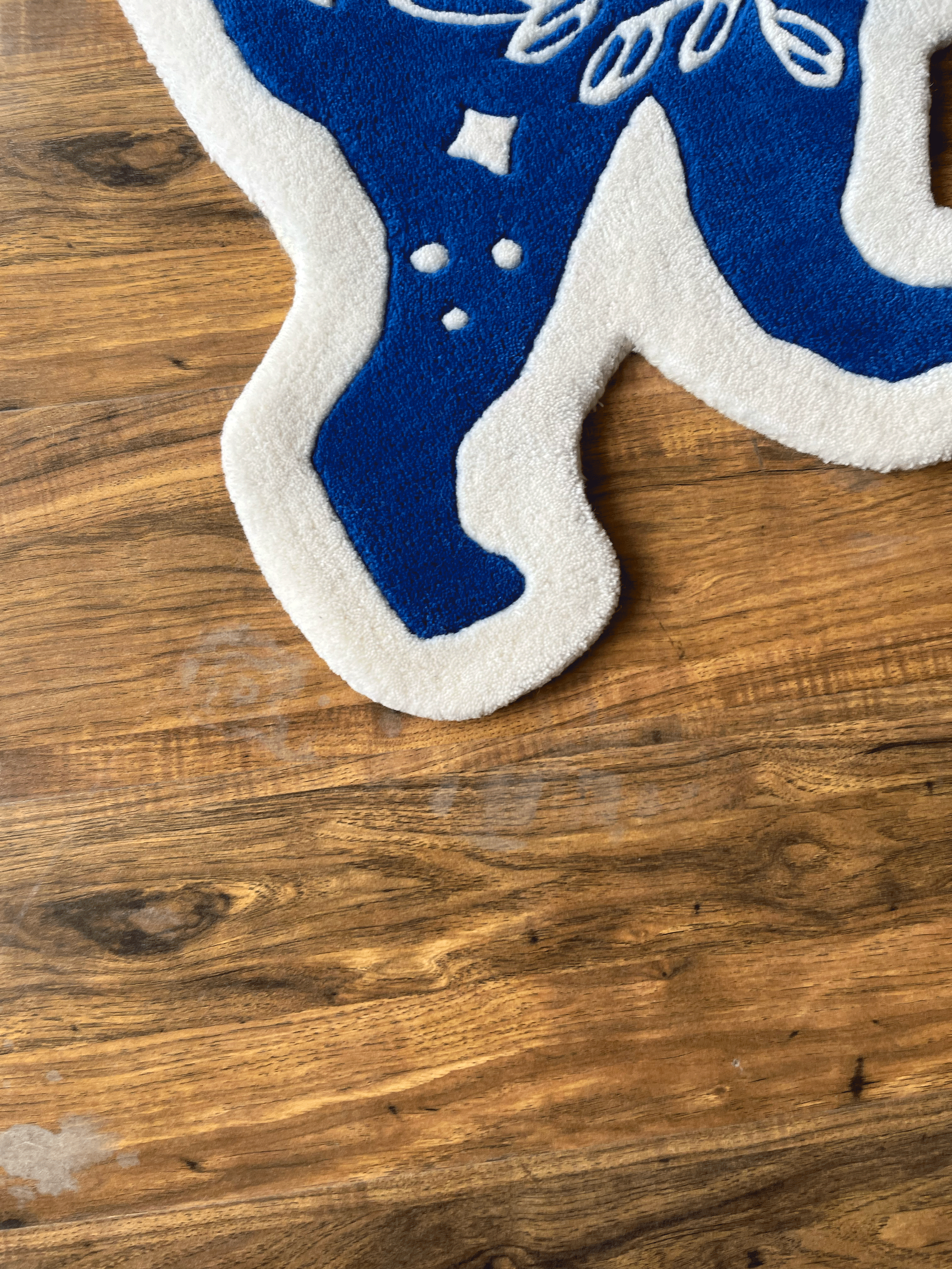 karma is a Cat hand tufted rug by The Drip Co.