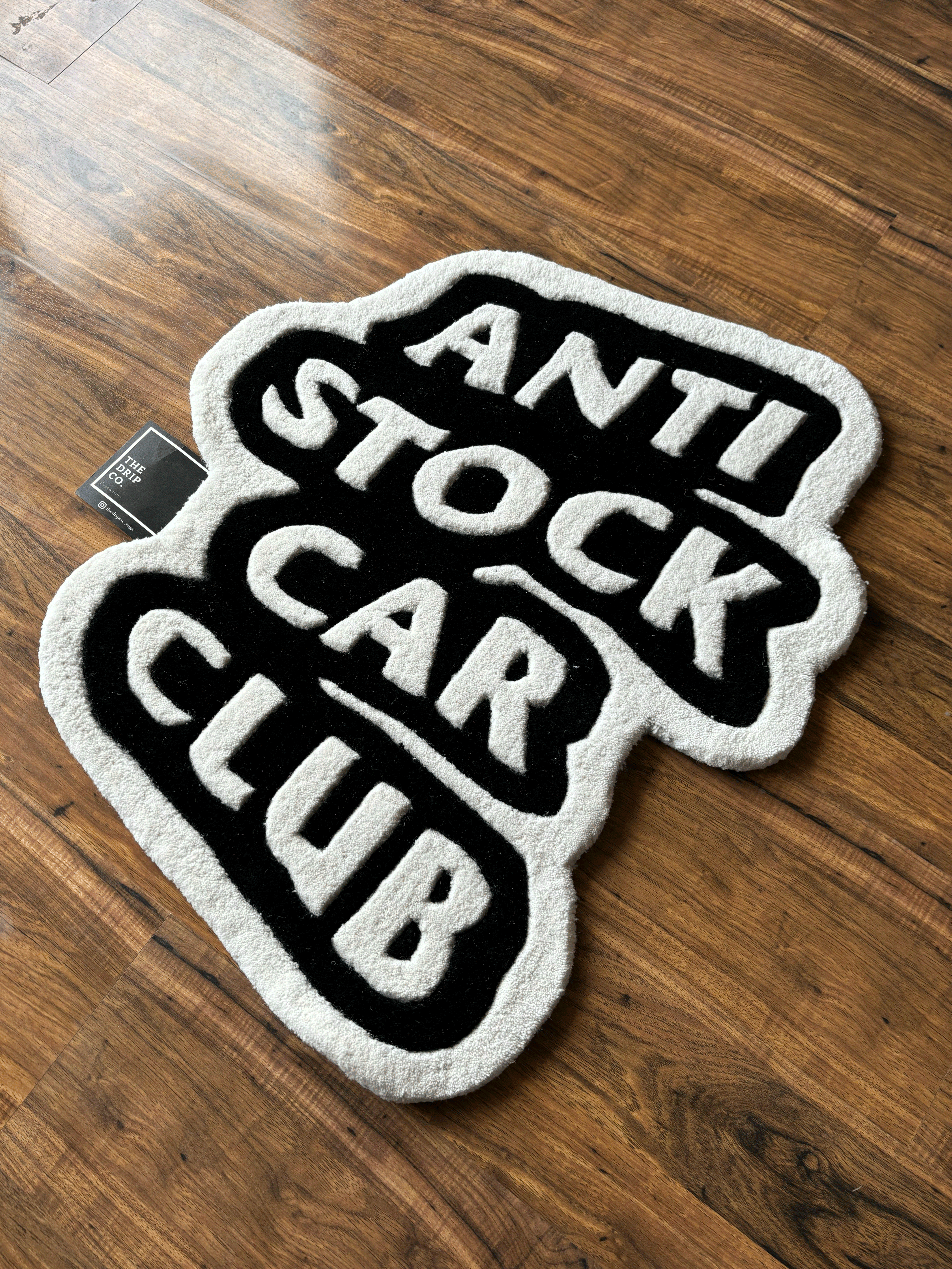 Anti Stock Car Club Hand Tufted Rug by The Drip Co.