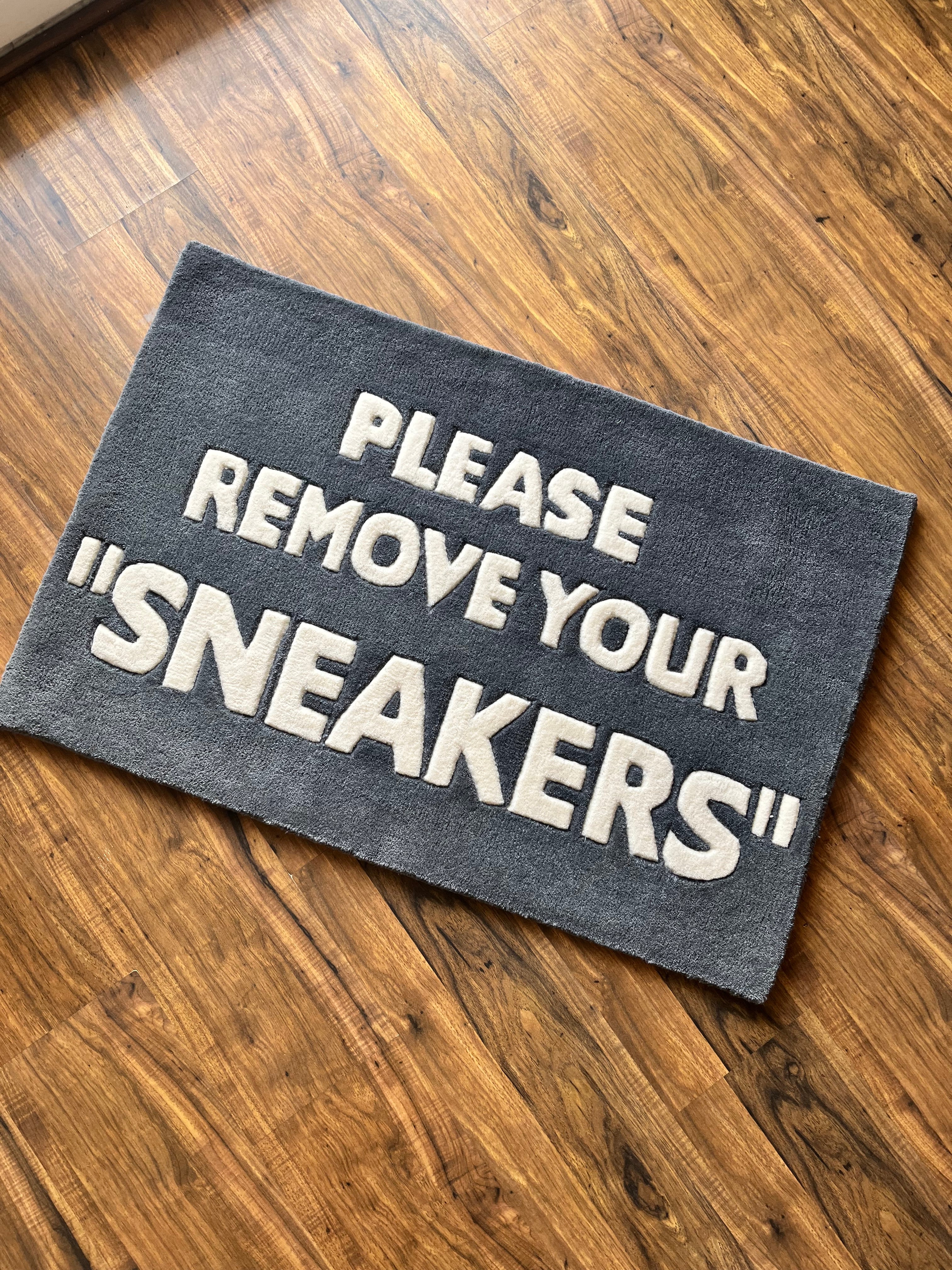 Remove your Sneakers Rug